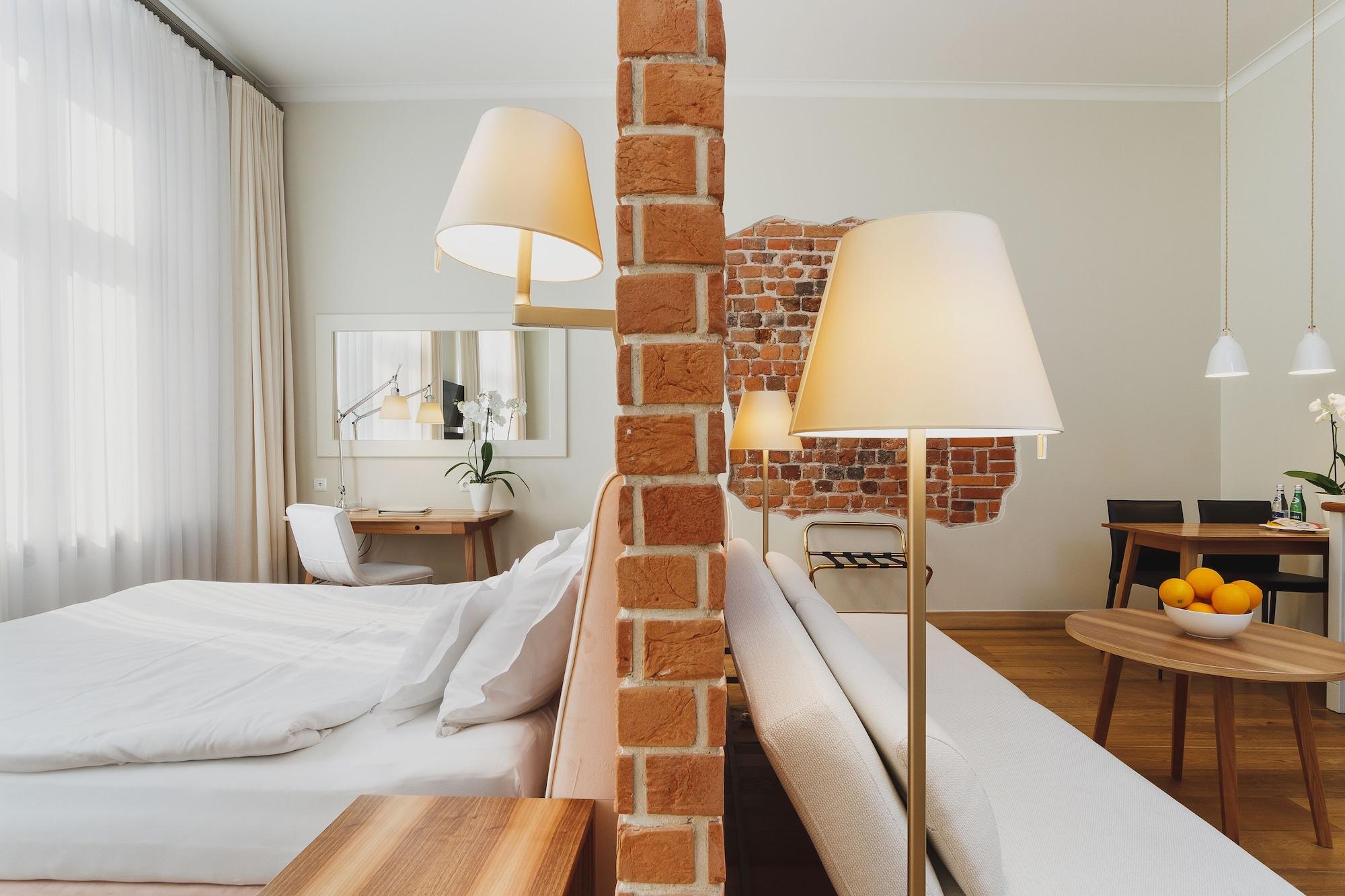 Bracka 6 Hotel apartamentowy 4*